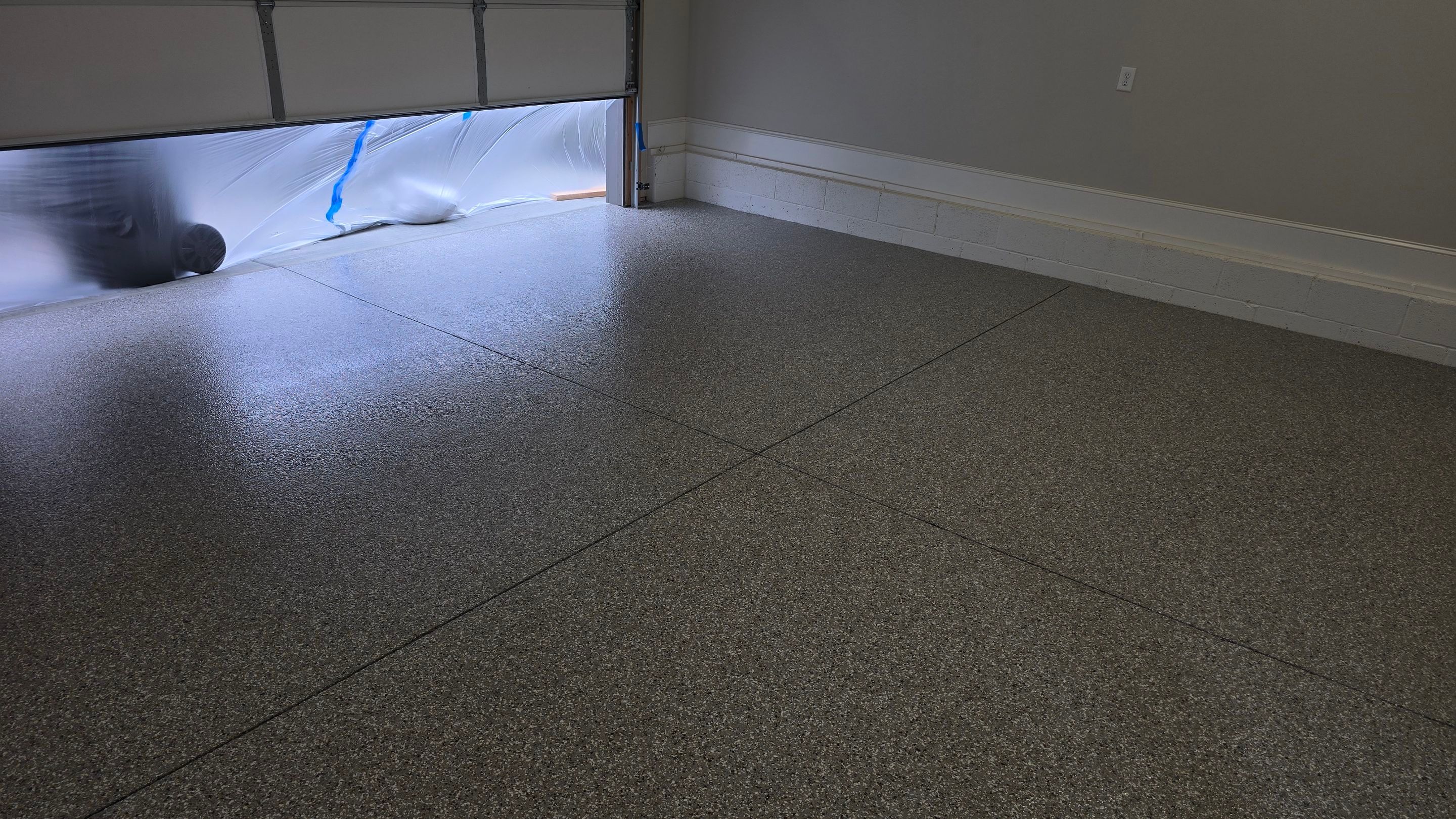Garage Using Creekbed by Elite Floor Solutions