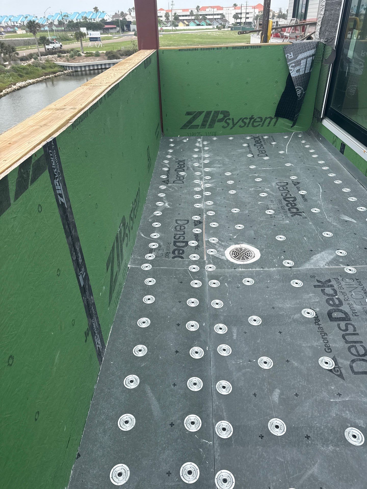 Walk Out, Island Style by Bayfront Roofing and Construction