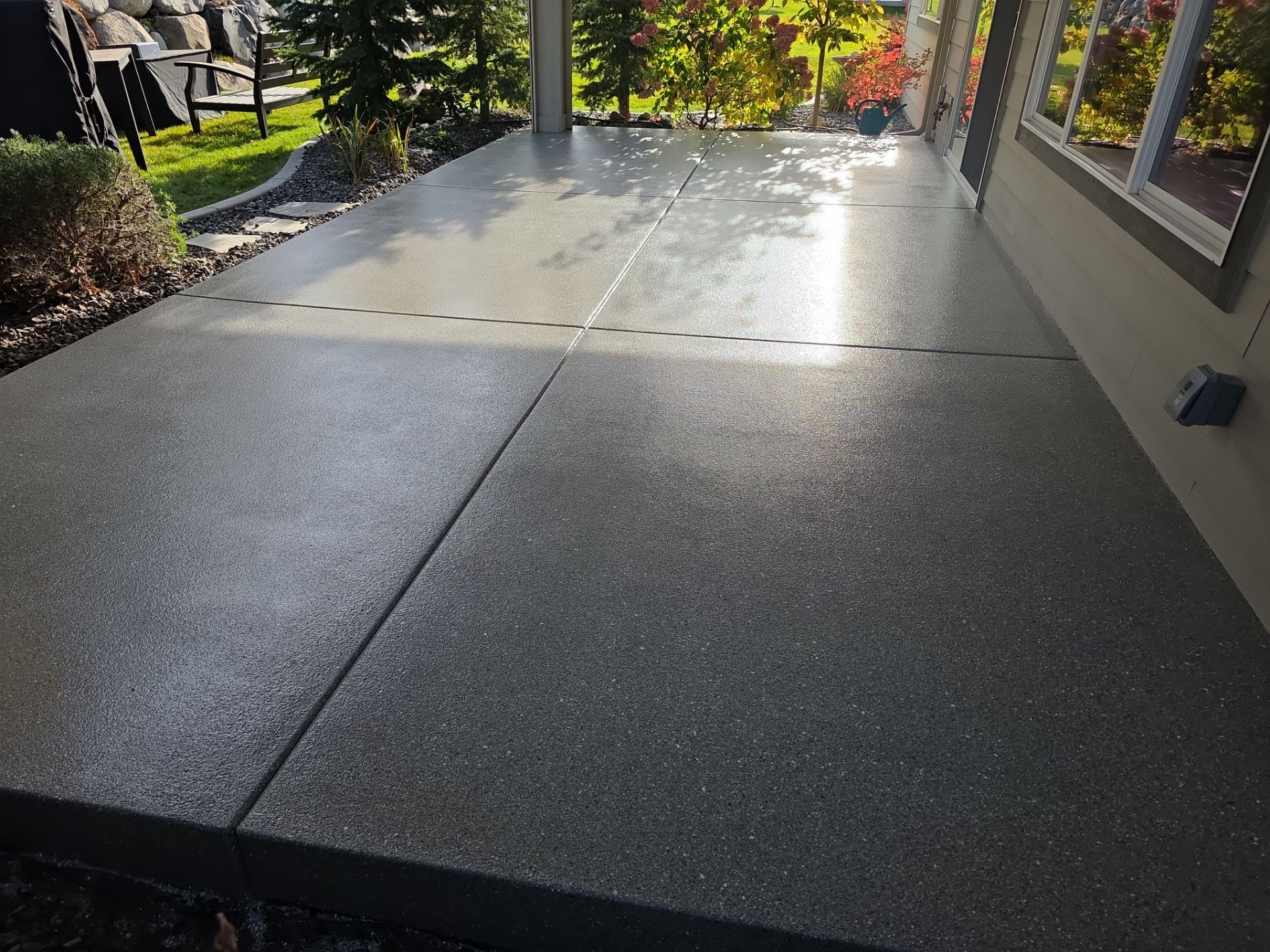 Front Porch and Back Patio Concrete Transformation in Liberty Lake by Croc Coatings, LLC