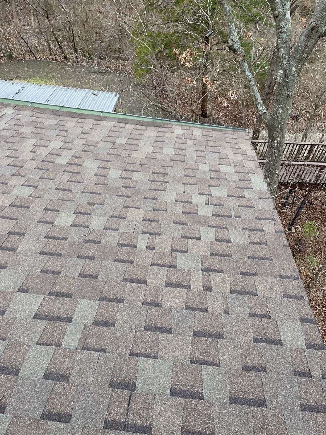 Residential Roofing Installation using Standing Seam Metal Roofing and Composition Shingles by Rainy Day Restoration