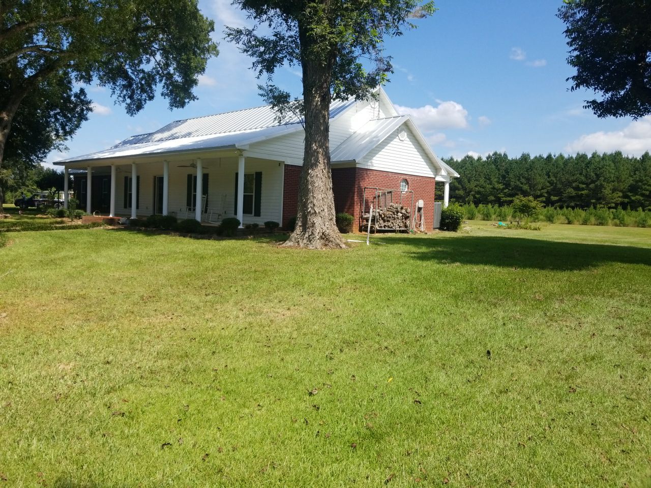 Residential Roofing Installation using Metal roofing by American Roofing & Construction LLC