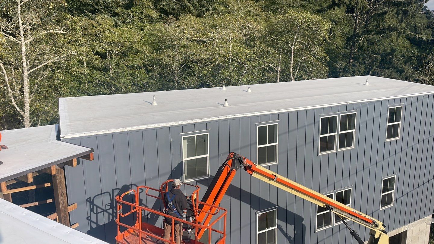 Commercial Roofing Installation using GAF 60Mil TPO  by Orezona Building & Roofing Company, Inc.