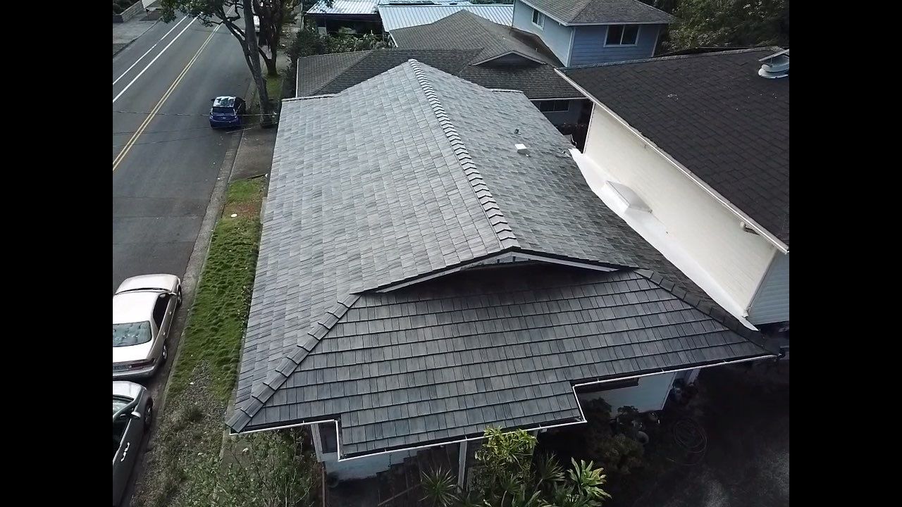 DaVinci Select Shake Conversion with TPO Cricket - Moanaloa Valley by First Class Roofing LLC