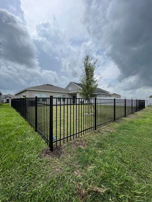 Aluminum Fence Installation using Black 3 Rail Aluminum Fence