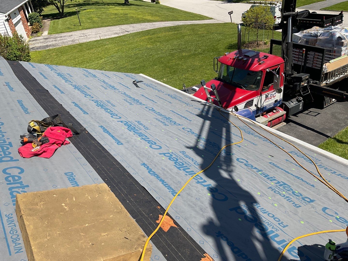 Residential Roofing Installation using Landmark Shingles Color Weatherwood by Alpha Design Services