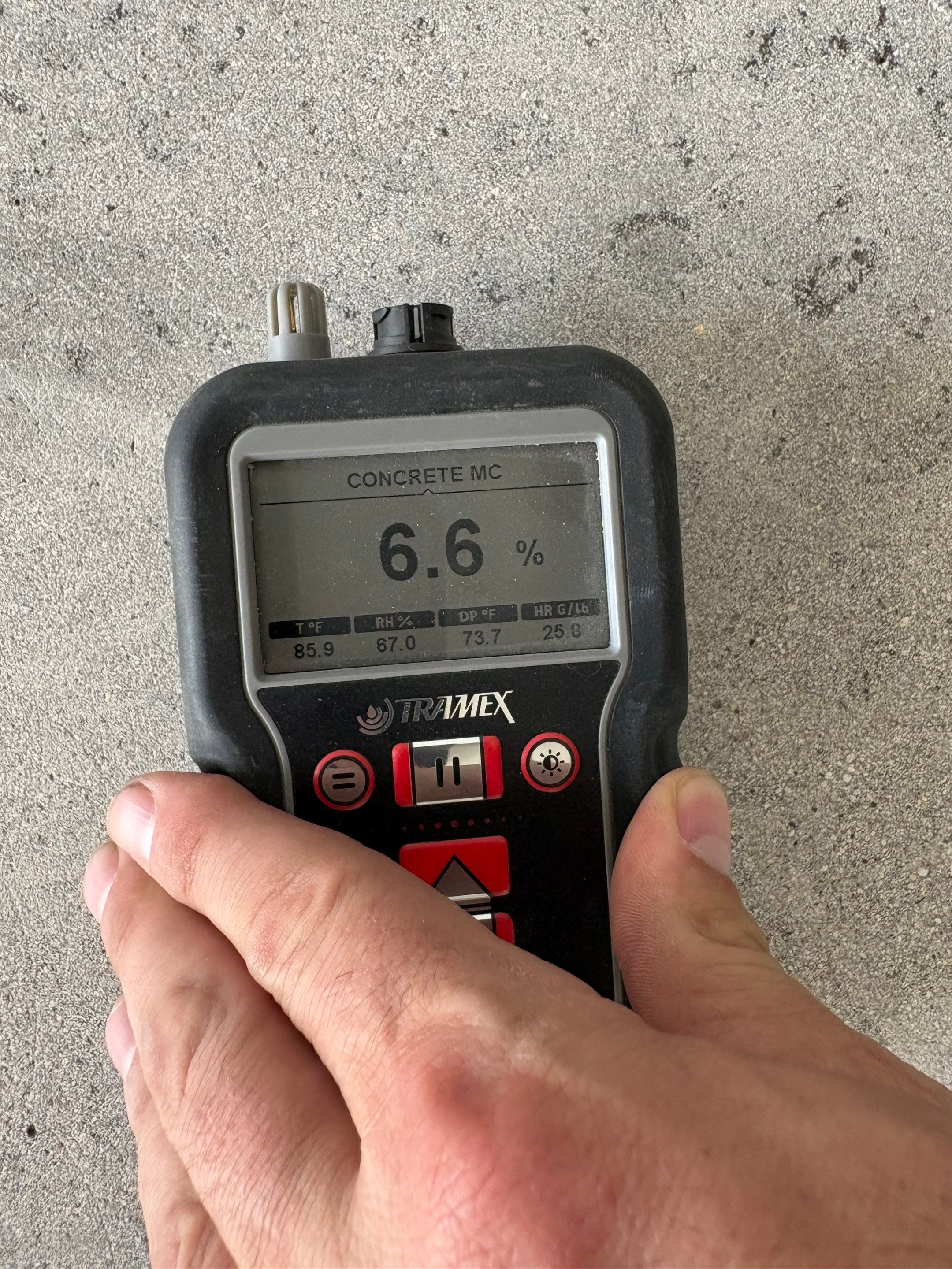 Sioux Falls Garage Concrete Coating Installation with Domino Flake by Select Painting, Coatings & Garage Cabinets