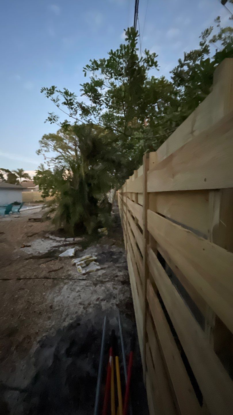 Wood Fence Installation using Horizontal Shadowbox Wood Privacy Fence by Asap fence and gates, LLC