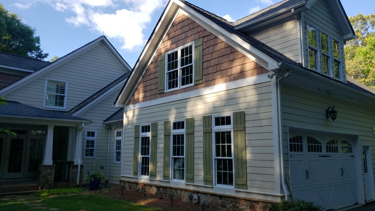 House Wash using cleaner by Power Wash Masters LLC