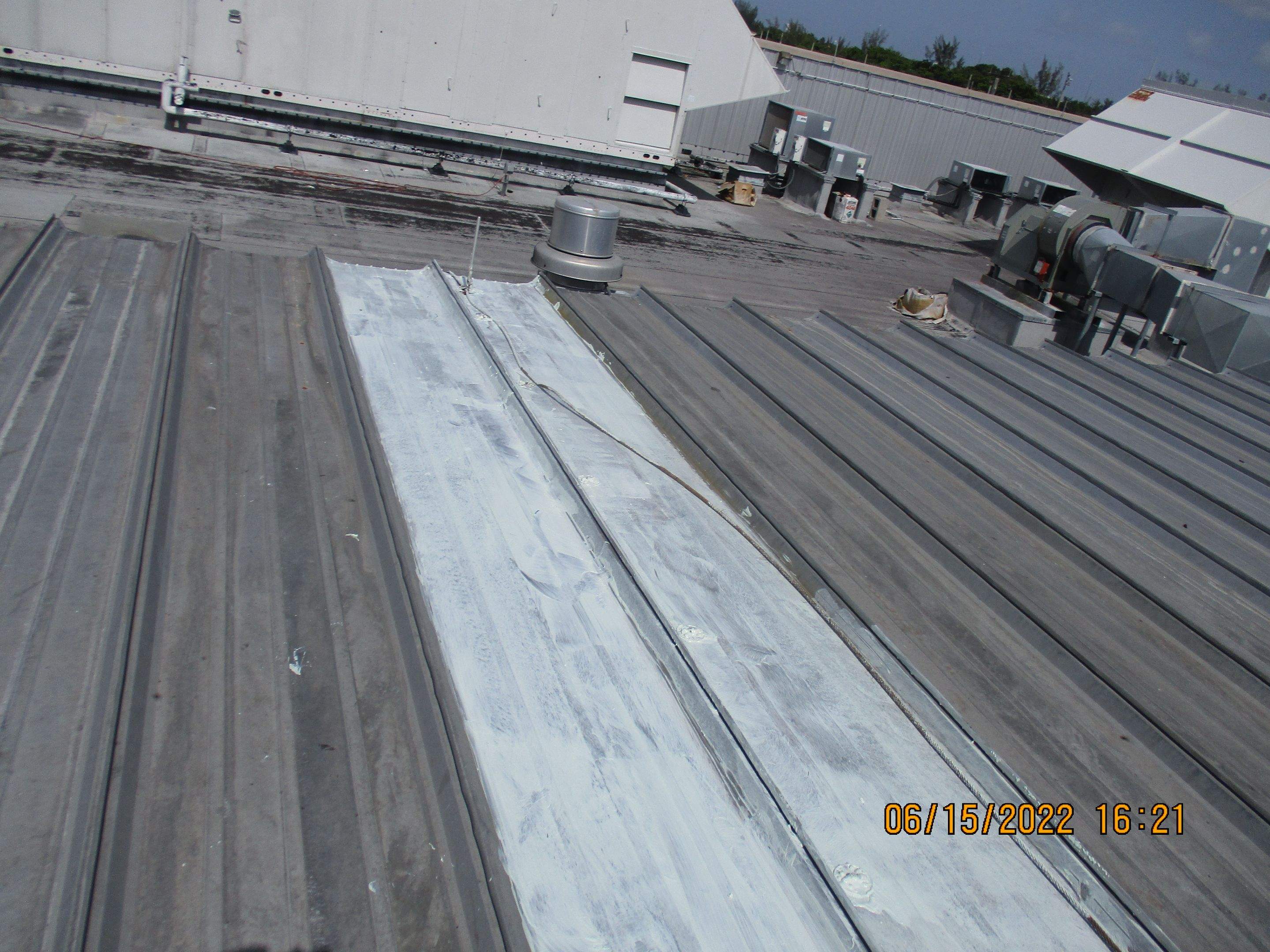 Calder Casino & Race Track Partial Metal Restoration  using #924 Eterna-Sil Premium Silicone Roof Coating by Morton Roofing, Inc.