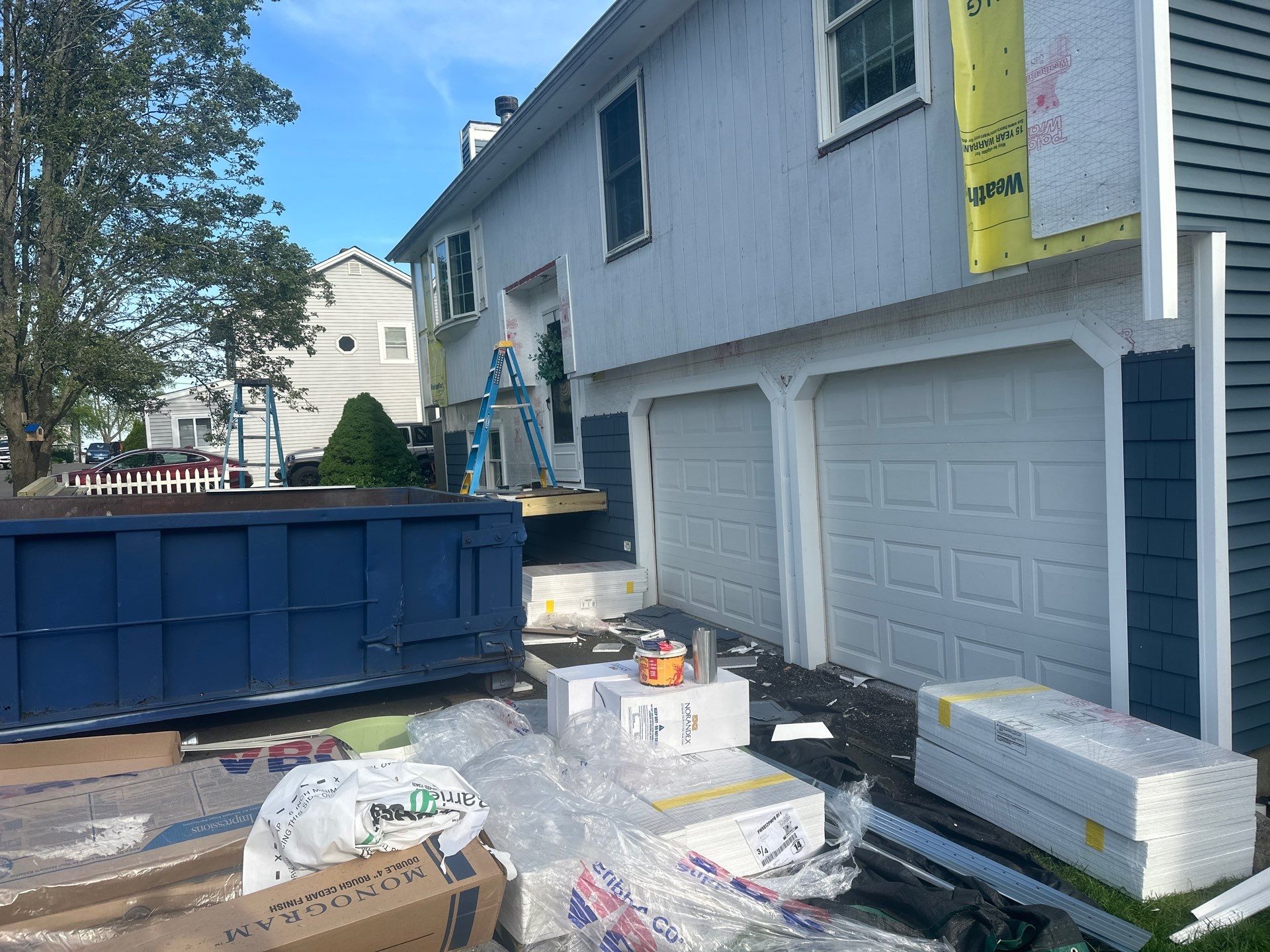Siding Installation using Certainteed Cedar Impressions Straight Edge Perfection Shingles - D7 - Pacific Blue by A Plus Exterior