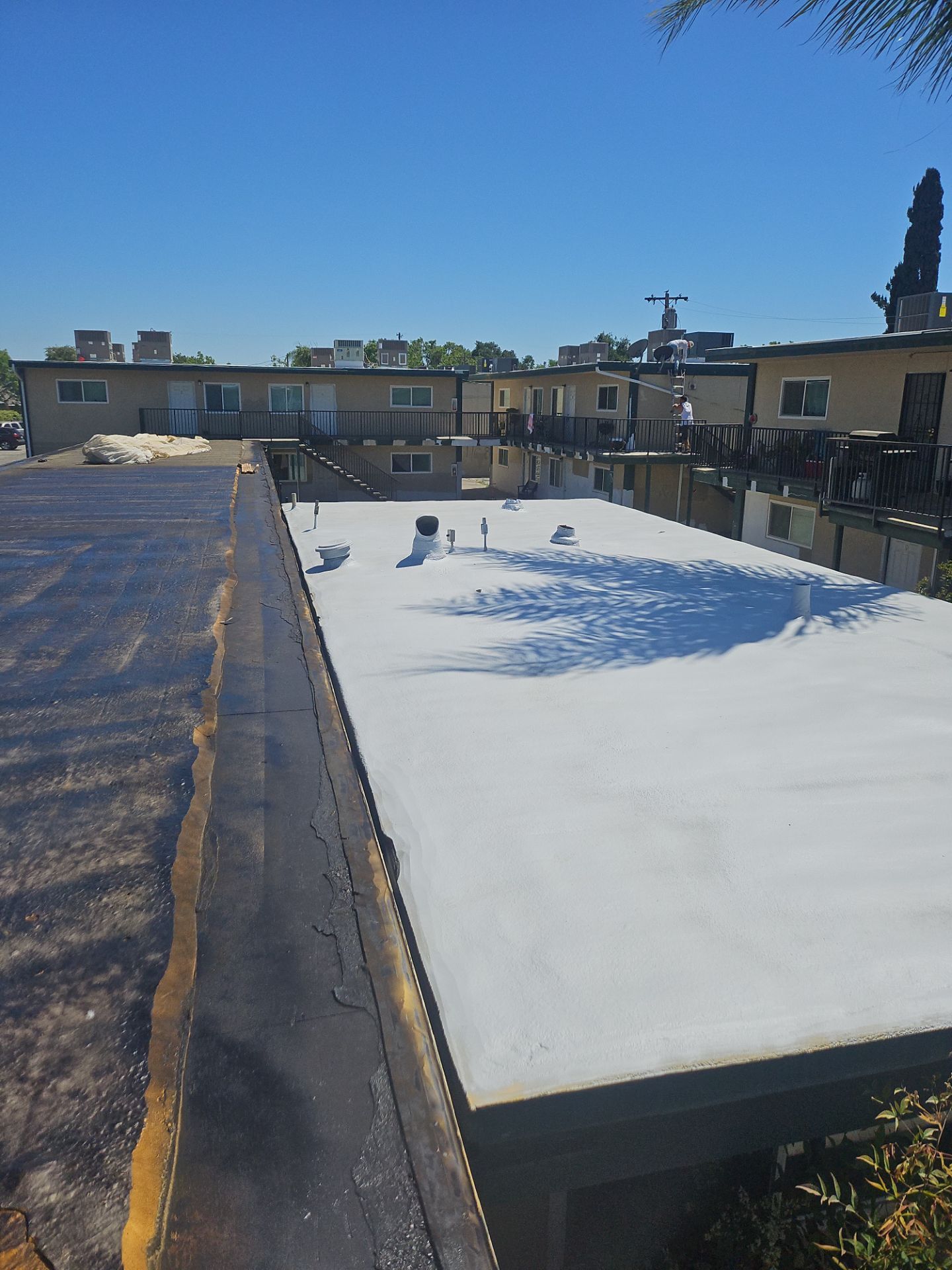 Foam Refurbish using General Coatings acrylic coatings and spray foam by Straight Edge Roofing Inc