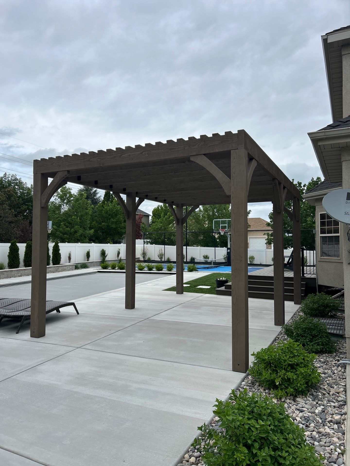 Poolside Concrete Patio Pergola by SAGE Decks