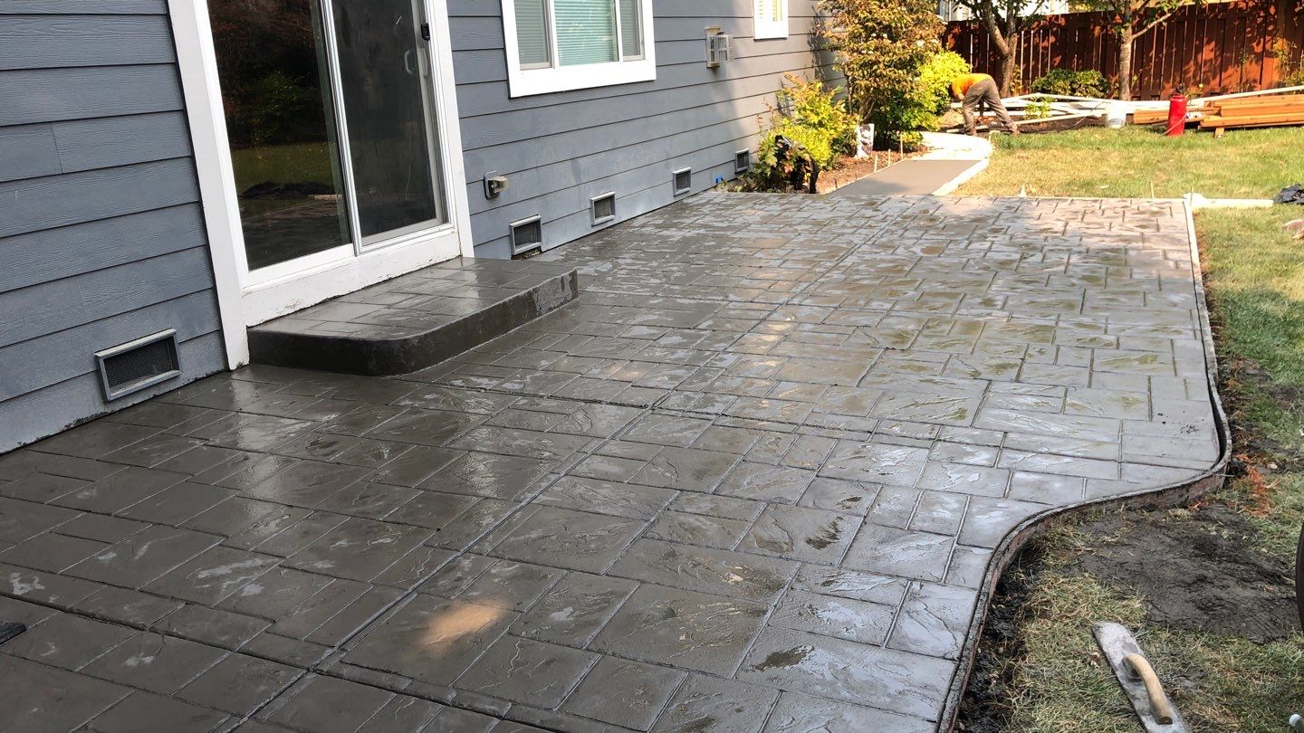  Amy | Stamped Finish Patio, Concrete Project by Jireh Asphalt & Concrete Inc 