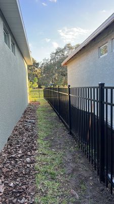 Aluminum Fence Installation using Black 3 Rail Aluminum Fence