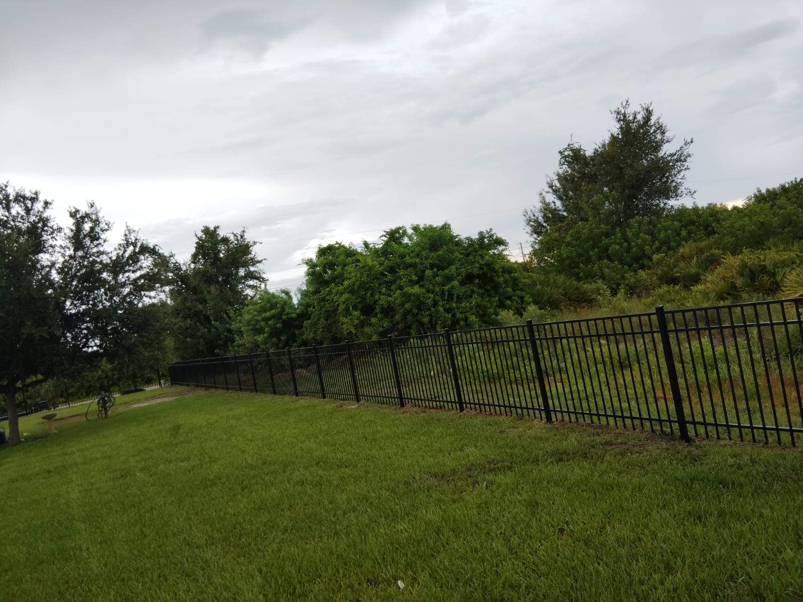 Black Aluminum Picket Fence Installation for Port Charlotte Residence by True Fence LLC