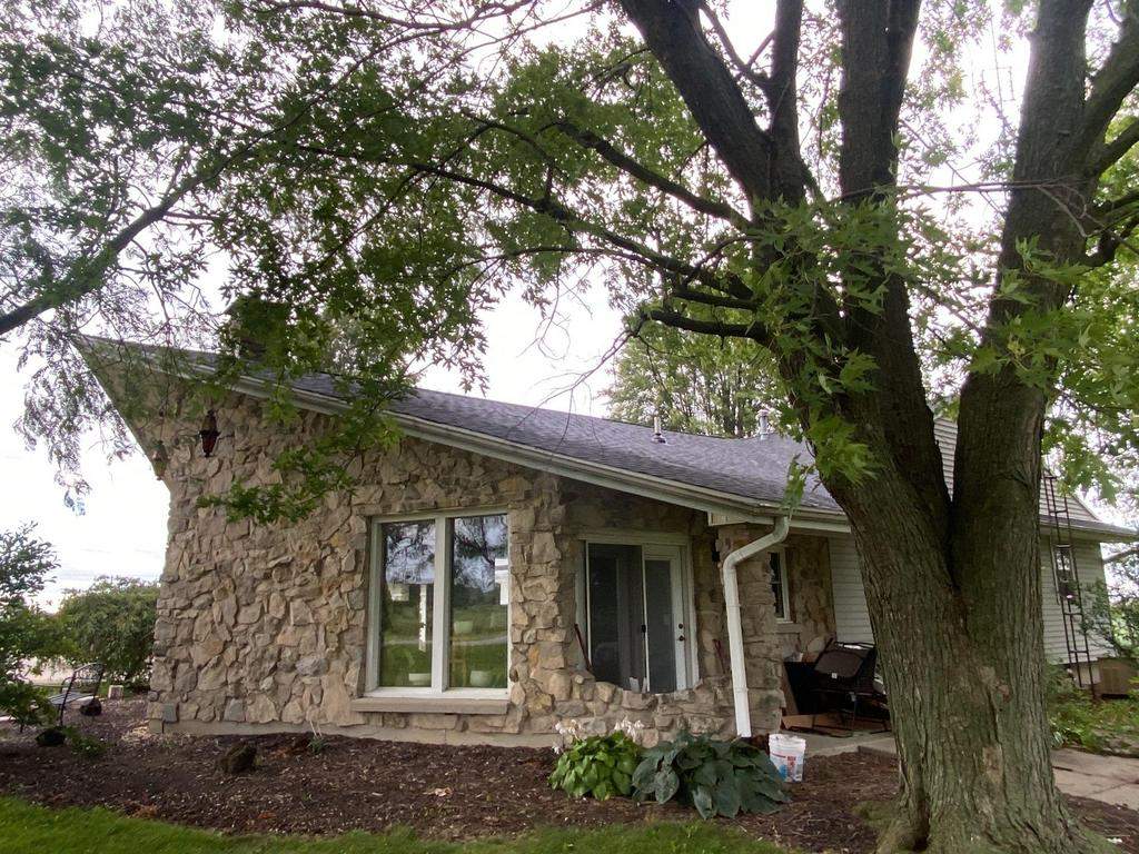 Storm damage roof replacement by Nitro Roofing and Construction