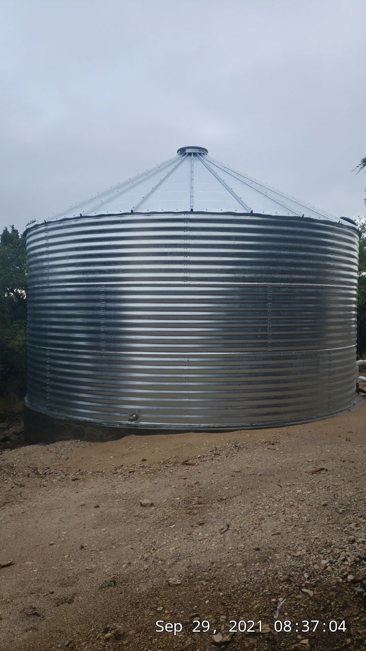 Cliffside installation for primary water source. by Hill Country Rain Water