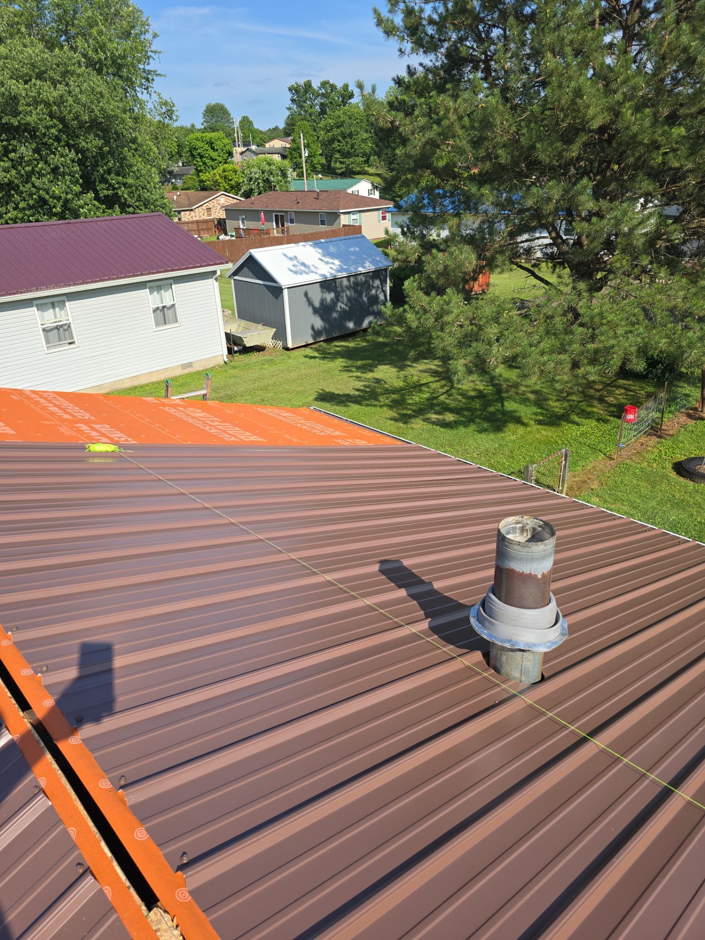 Residential Roofing Installation using Metal by Rainstoppers Roofing