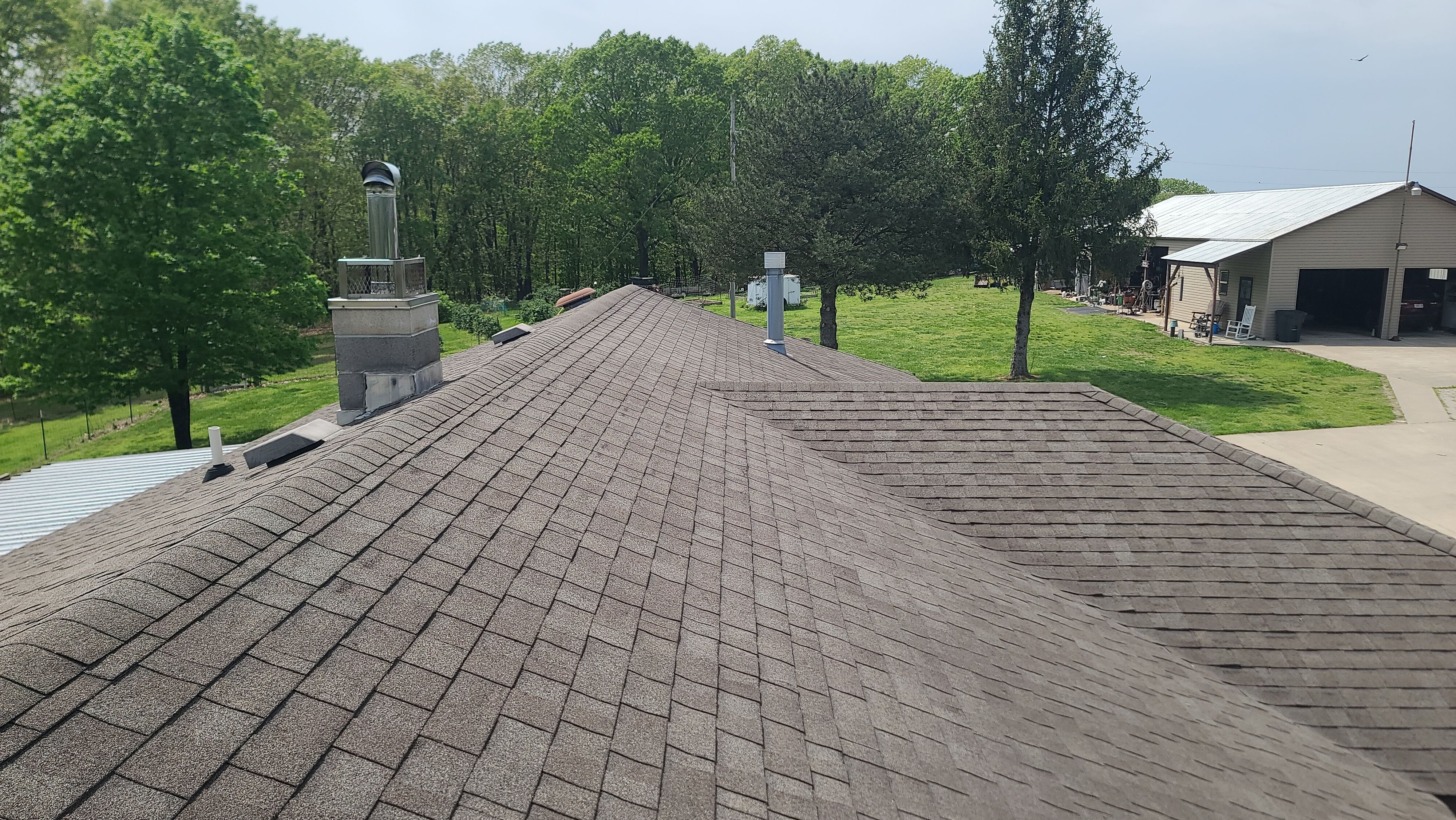 Residential Multi Structure Roofing Install - Atlas Pinnacle Pristine Shingles - Color Copper Canyon  by Titan Commercial & Residential Roofing 