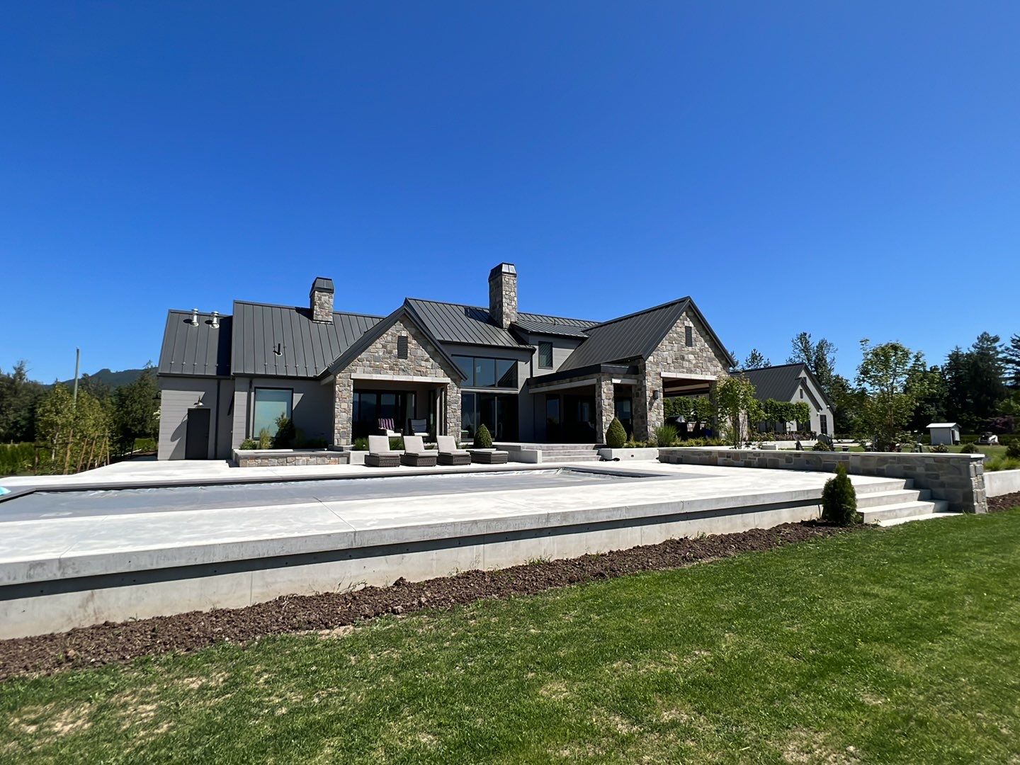 Residential Roofing Installation using 12" Prolok metal  by Top Notch Roofing Inc