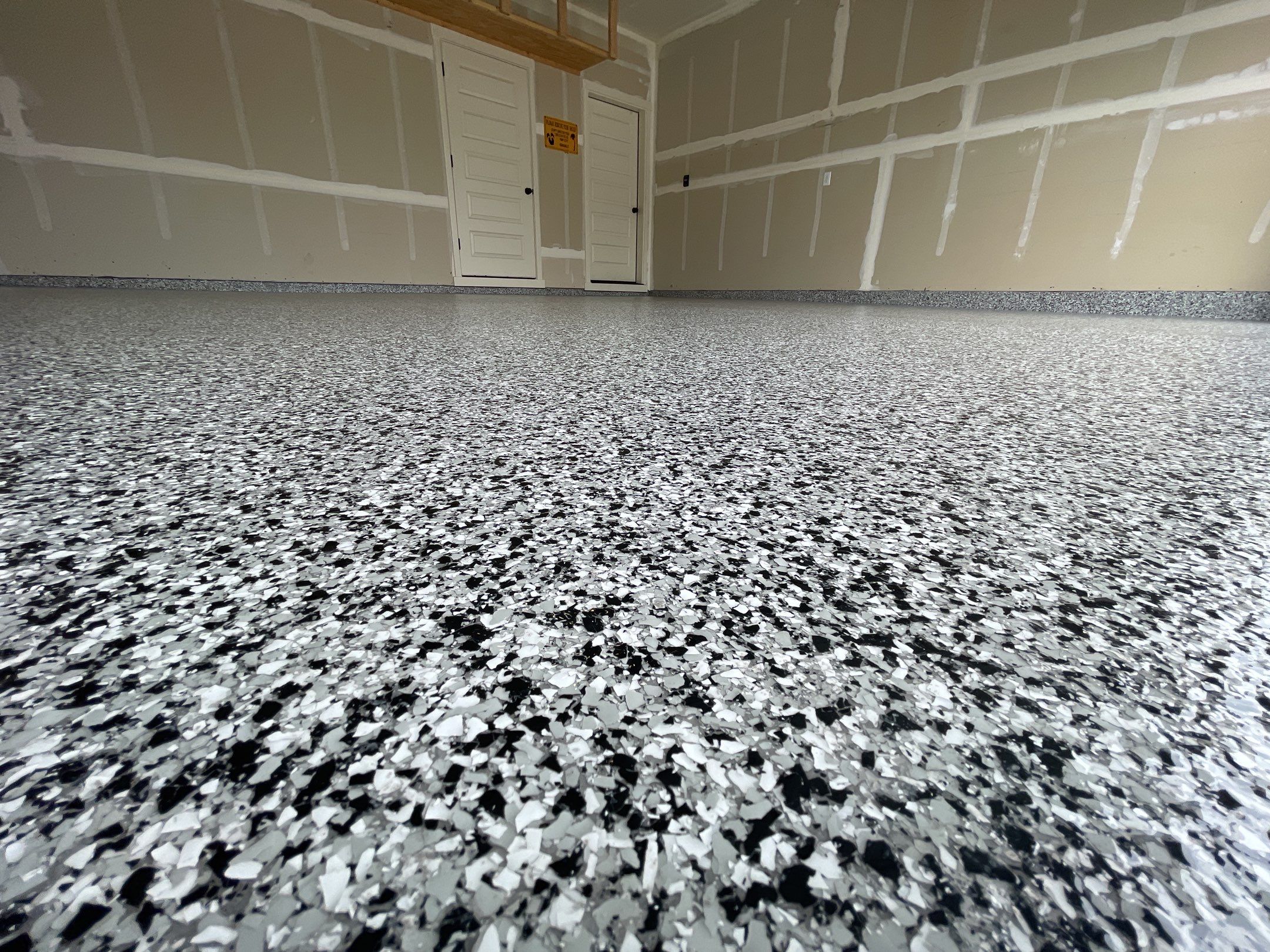 Garage Transformation using Domino by Croc Coatings, LLC