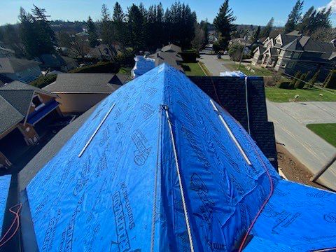 Residential Roofing Installation using Malarky Vista Midnight black by Top Notch Roofing Inc