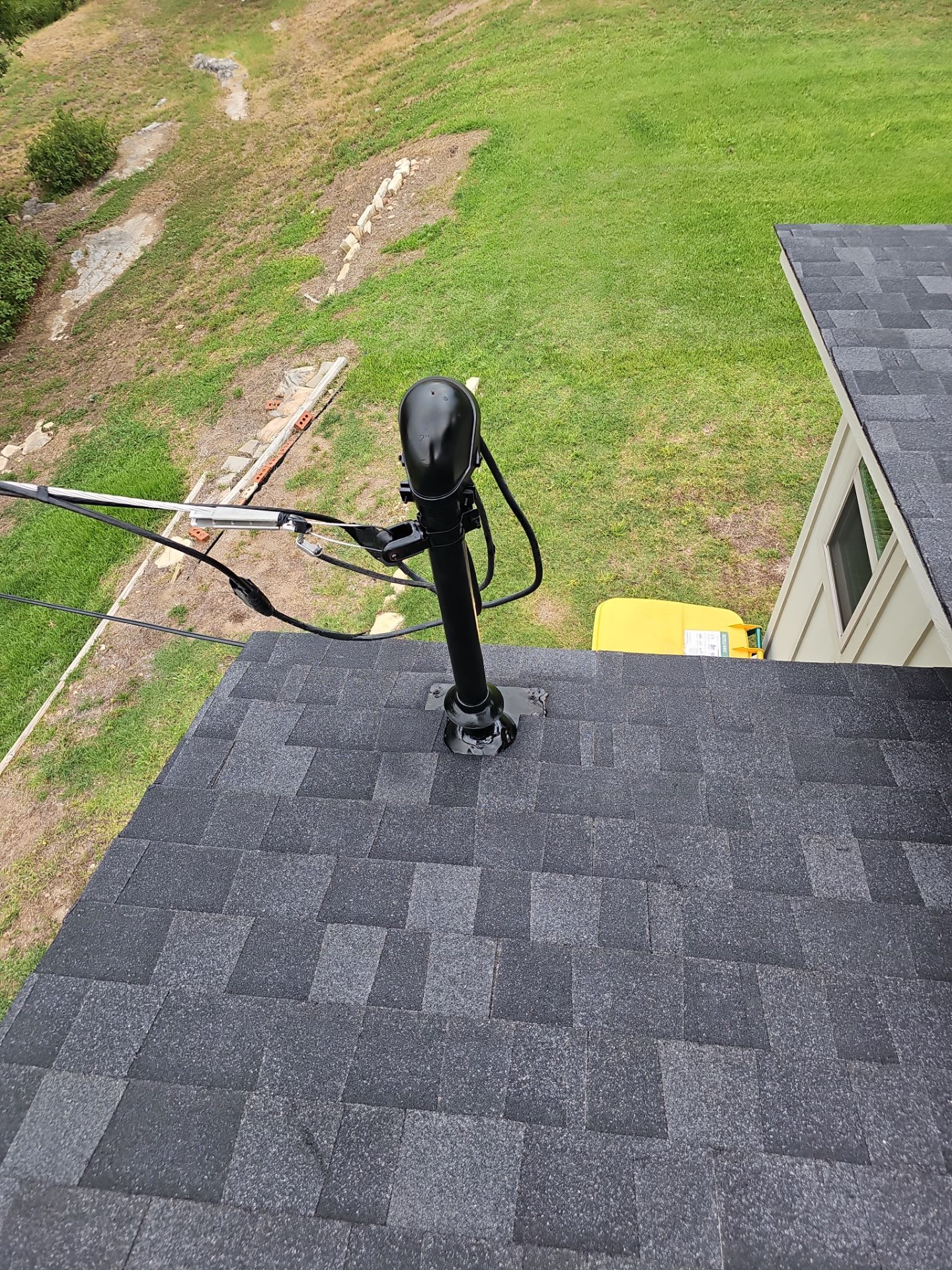 Residential Roofing Installation using Owens Corning Oakridge Onyx Black by DeZign Roofing & Exteriors