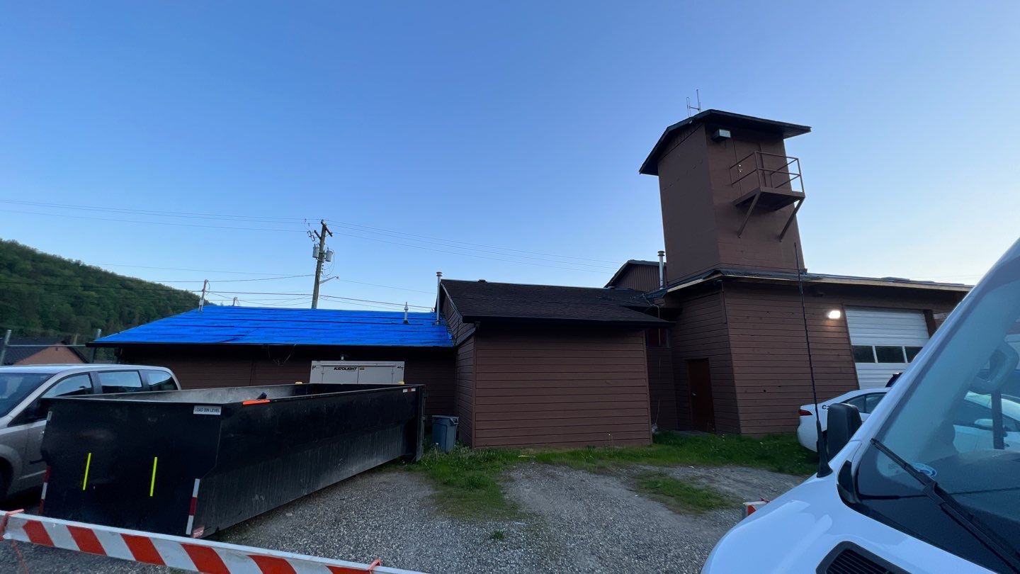 Commercial Roofing Installation using 12" Prolok metal  by Top Notch Roofing Inc