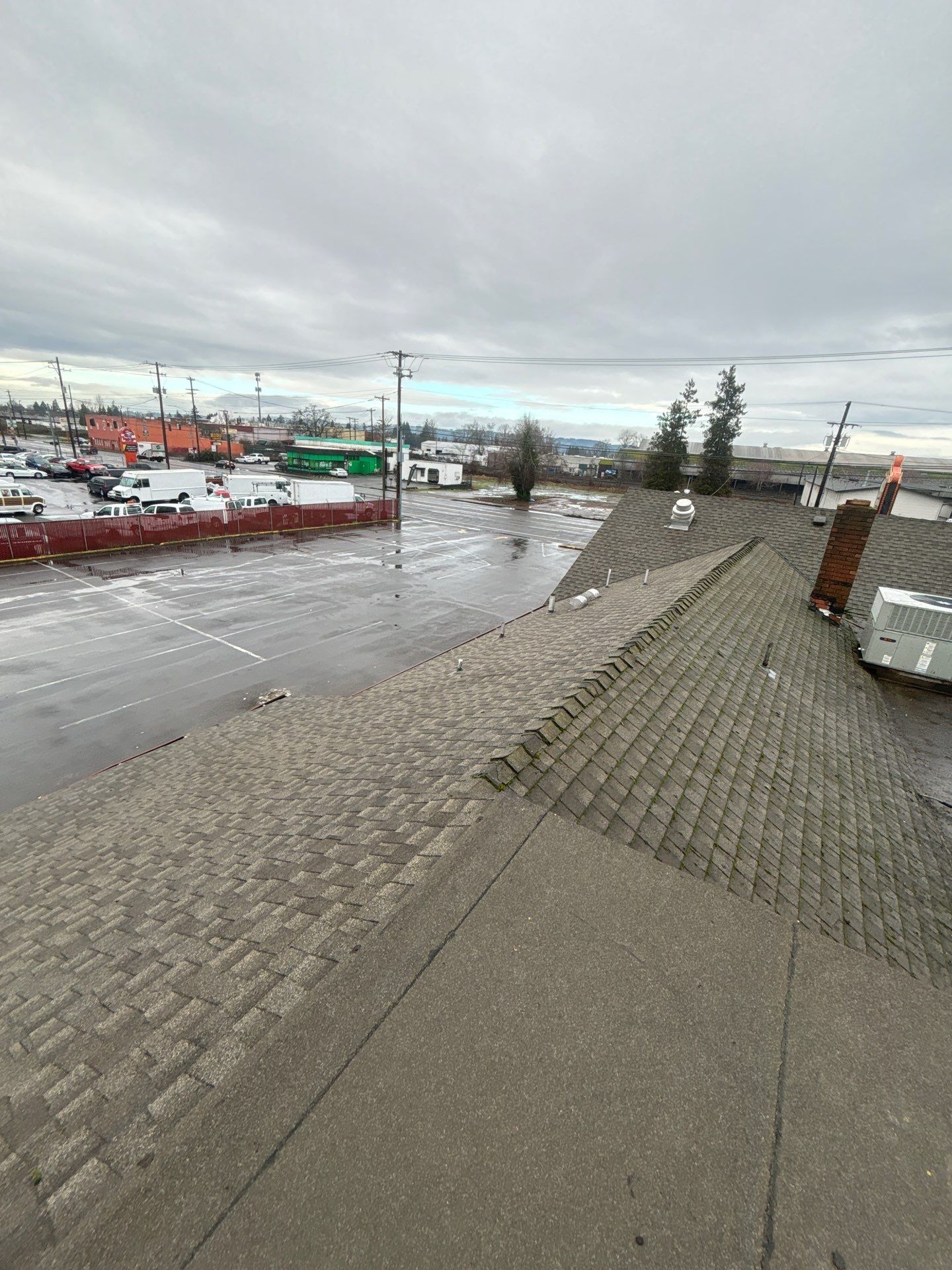 Summit Grey Lum Yun Salem Oregon Commercial Roof by Orezona Building & Roofing Company, Inc.