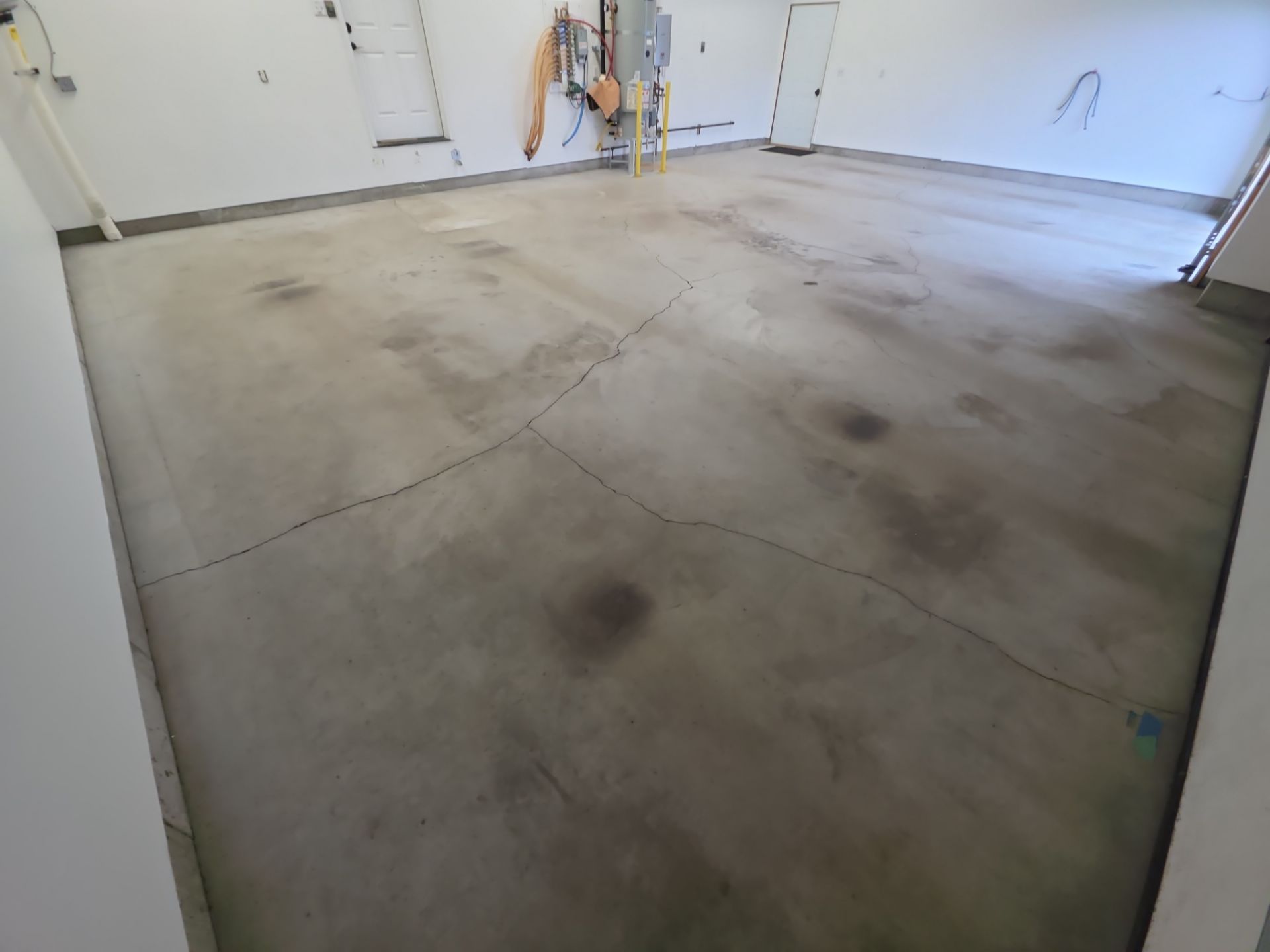 Travertine Hybrid Garage Floor Coating and Crack Repair in Spokane by Croc Coatings, LLC