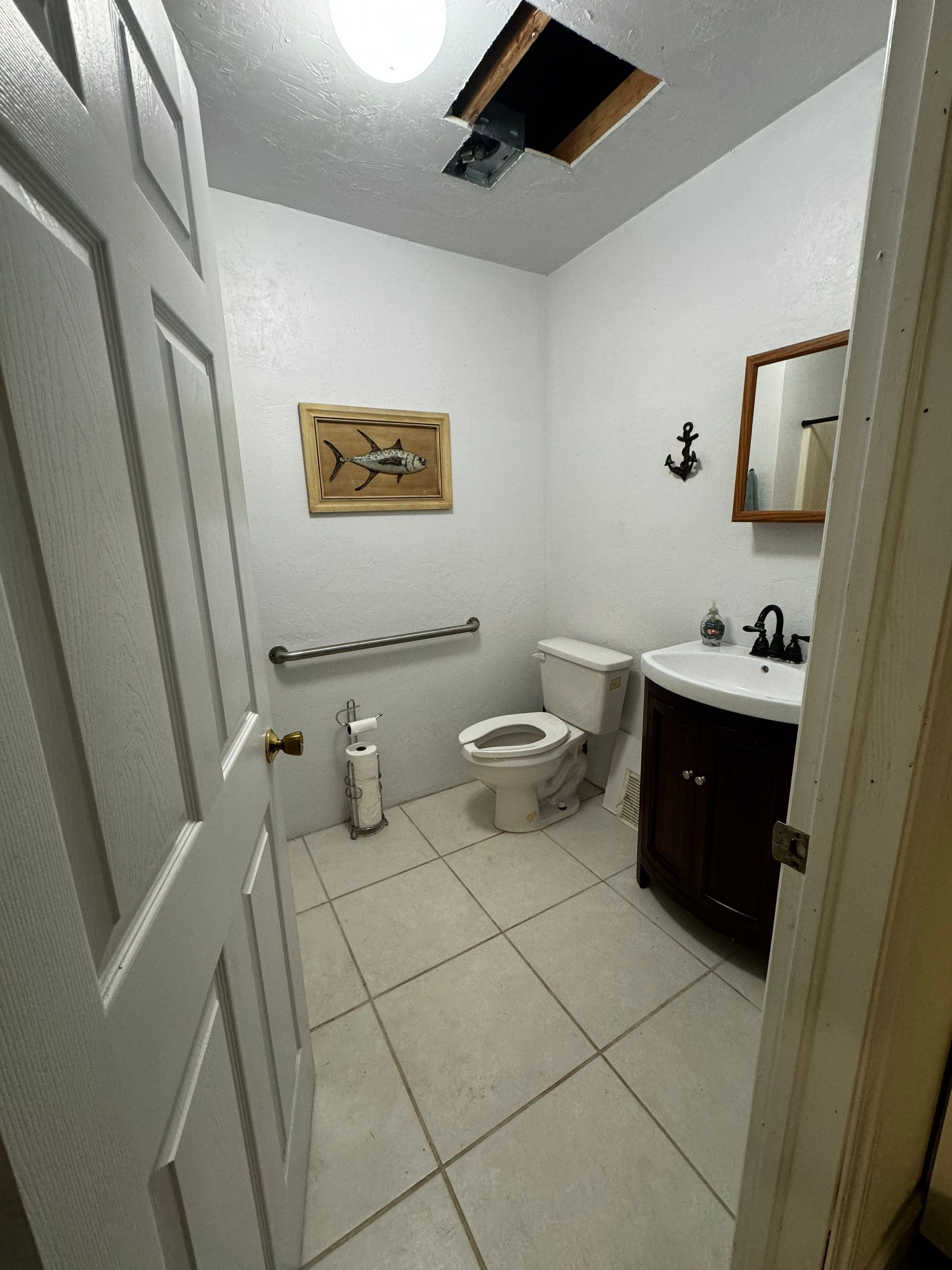 Living Space and Bathroom Remodel by Give Freedom Homes
