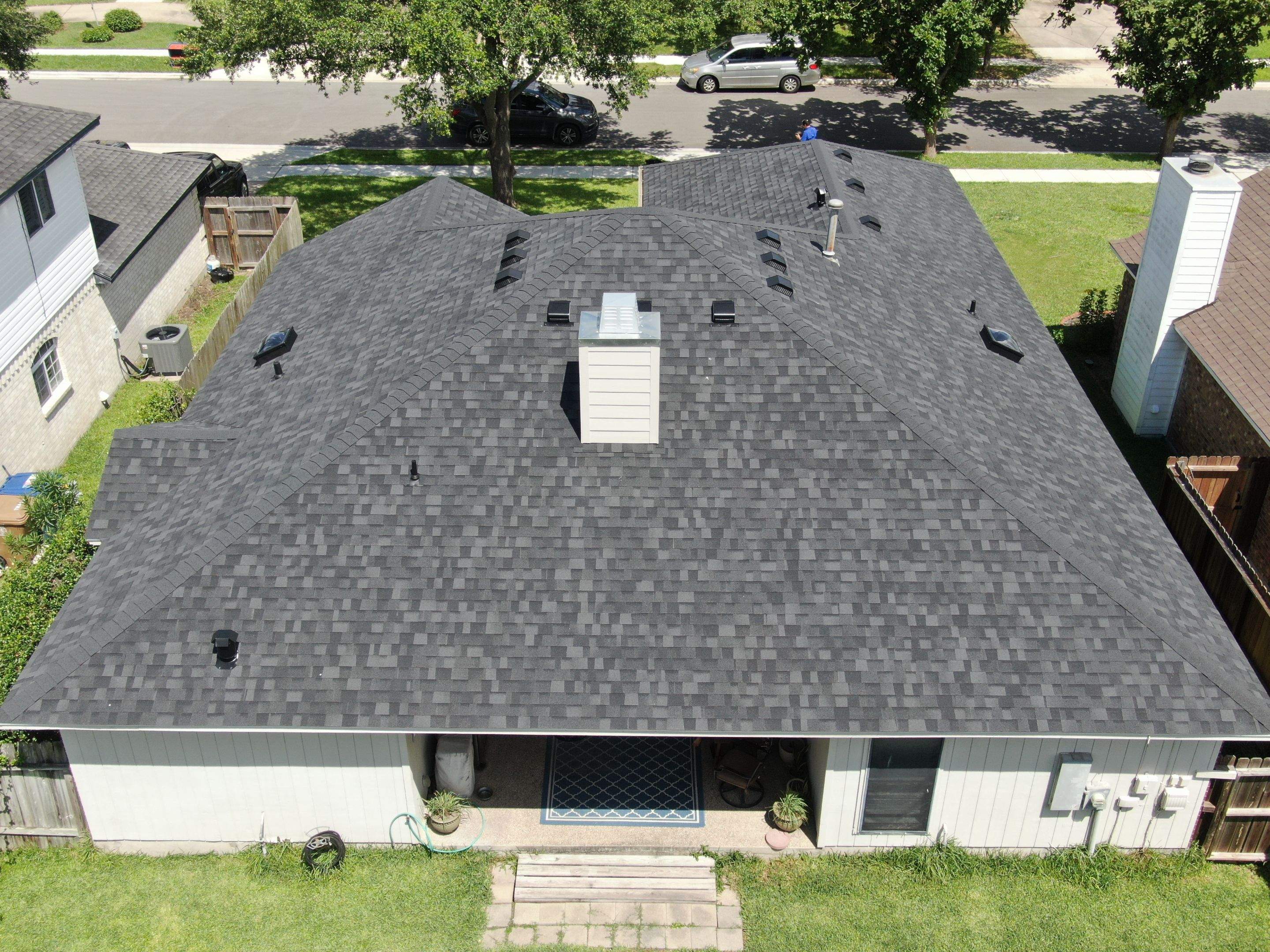 Nothing looks nicer than a little black roof by Bayfront Roofing and Construction