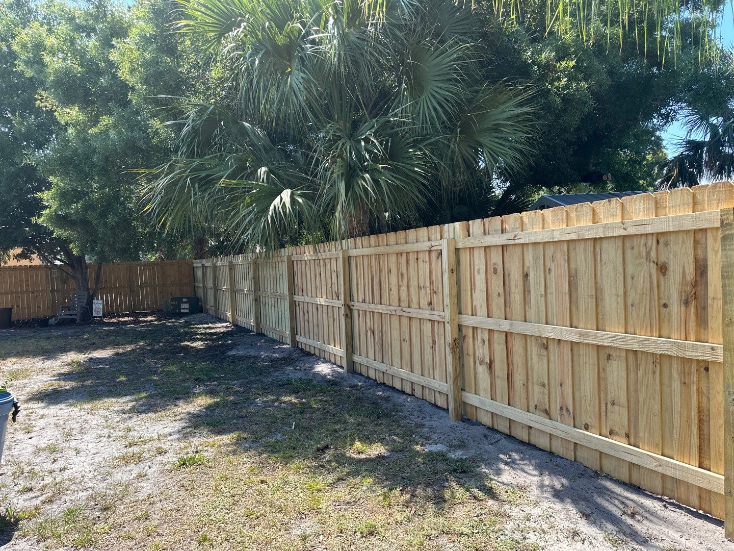 Wood Fence Installation using Wood Board on Board Fence by Asap fence and gates, LLC
