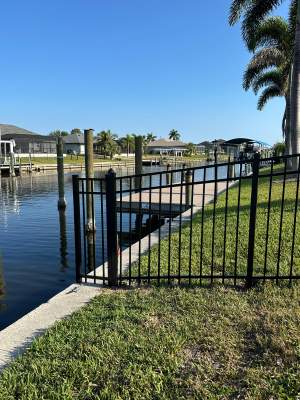 Waterfront Black Aluminum Fence Installation in Port Charlotte