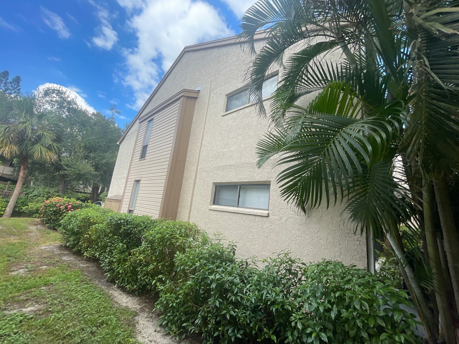 Clean Gutters and Roof in Sarasota FL by Gutter Professors