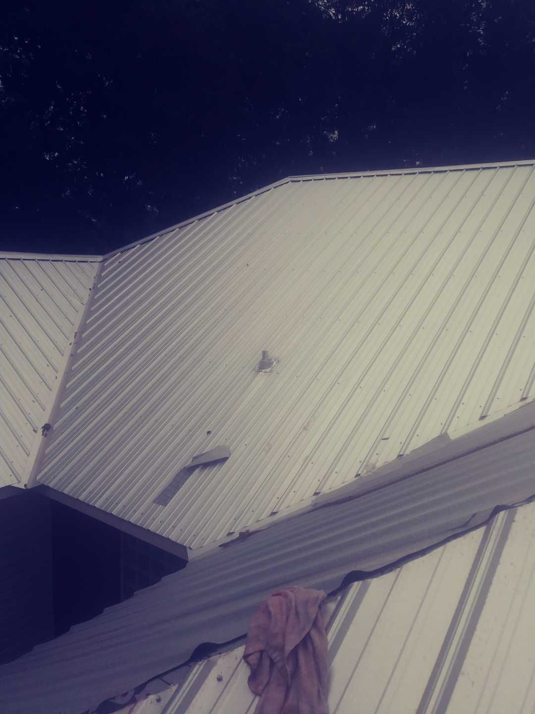 Residential Roofing Installation using Metal roofing by American Roofing & Construction LLC