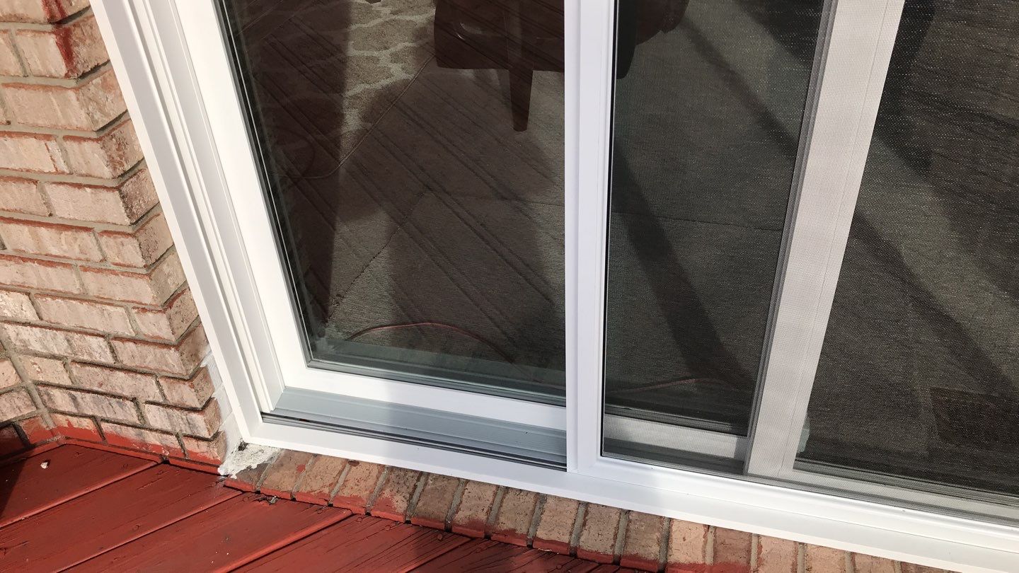 Deck Refurbush and Door Replacement using Trex Decking and Railing.  Polaris Patio Doors by Secure Construction Company Inc