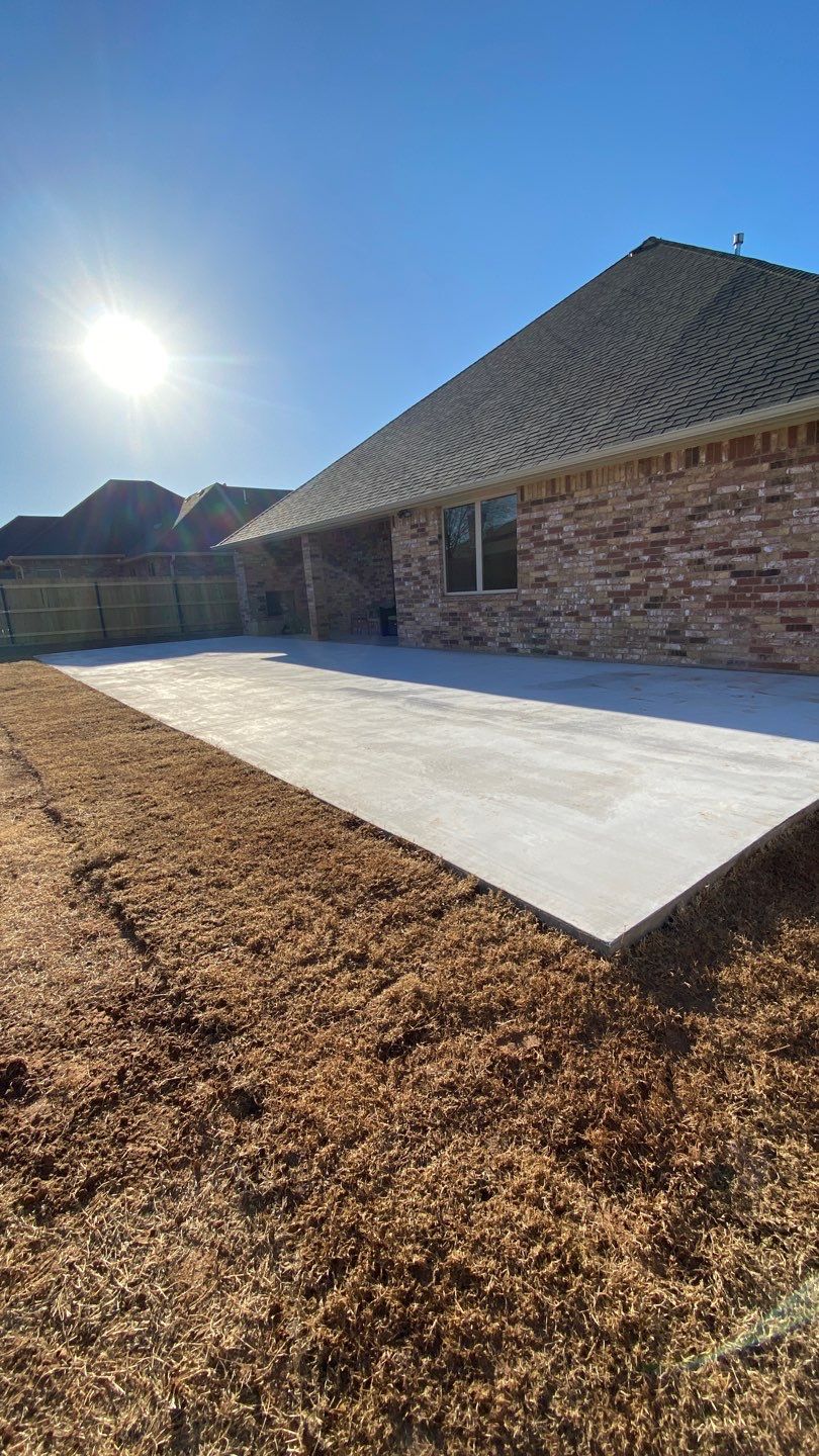 Concrete Slab , Retaining Wall , Fence, and landscape. by Clays Services Inc