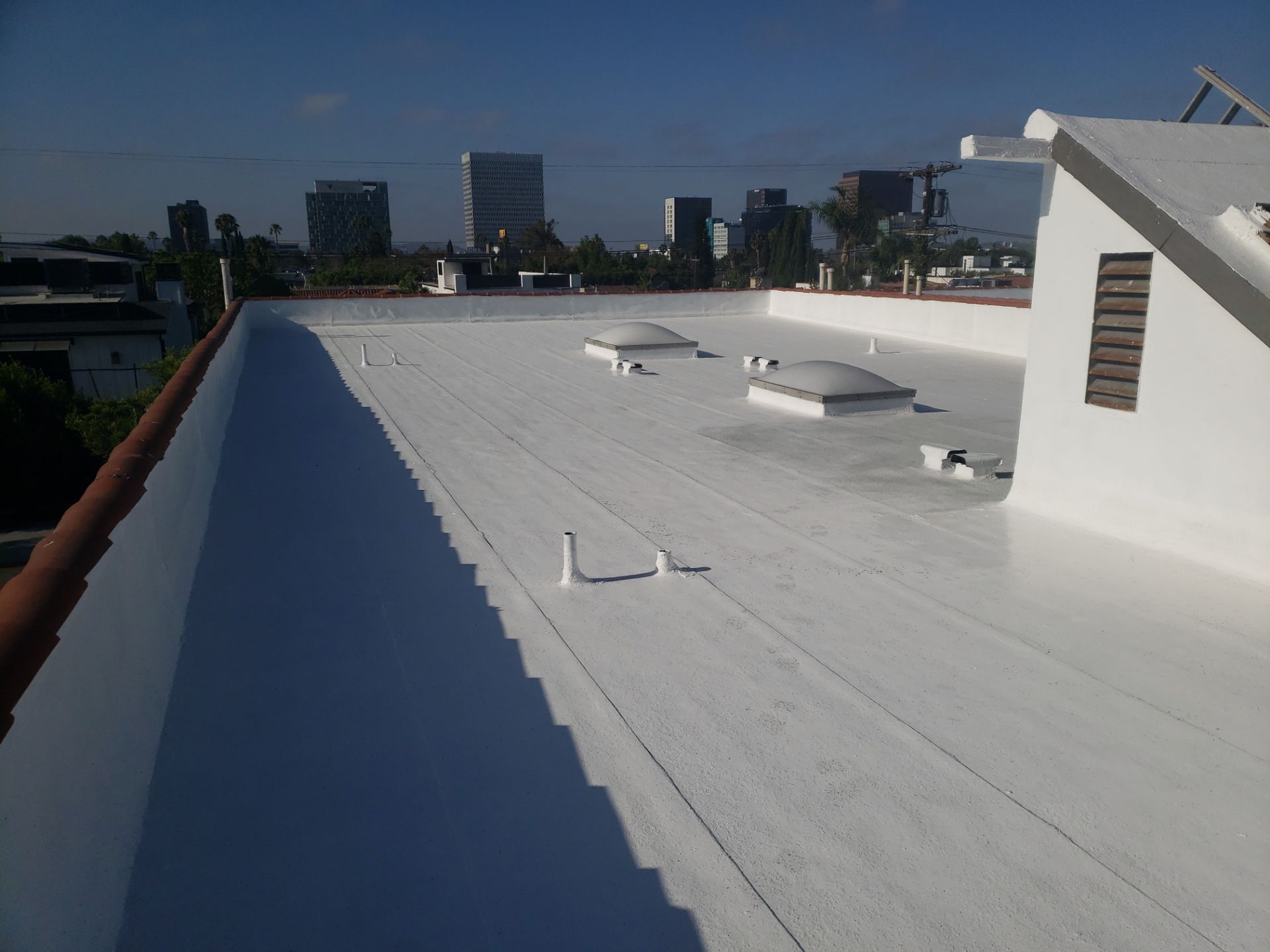 Commercial Roofing Installation using Silicone Coating by Hull Brothers Roofing