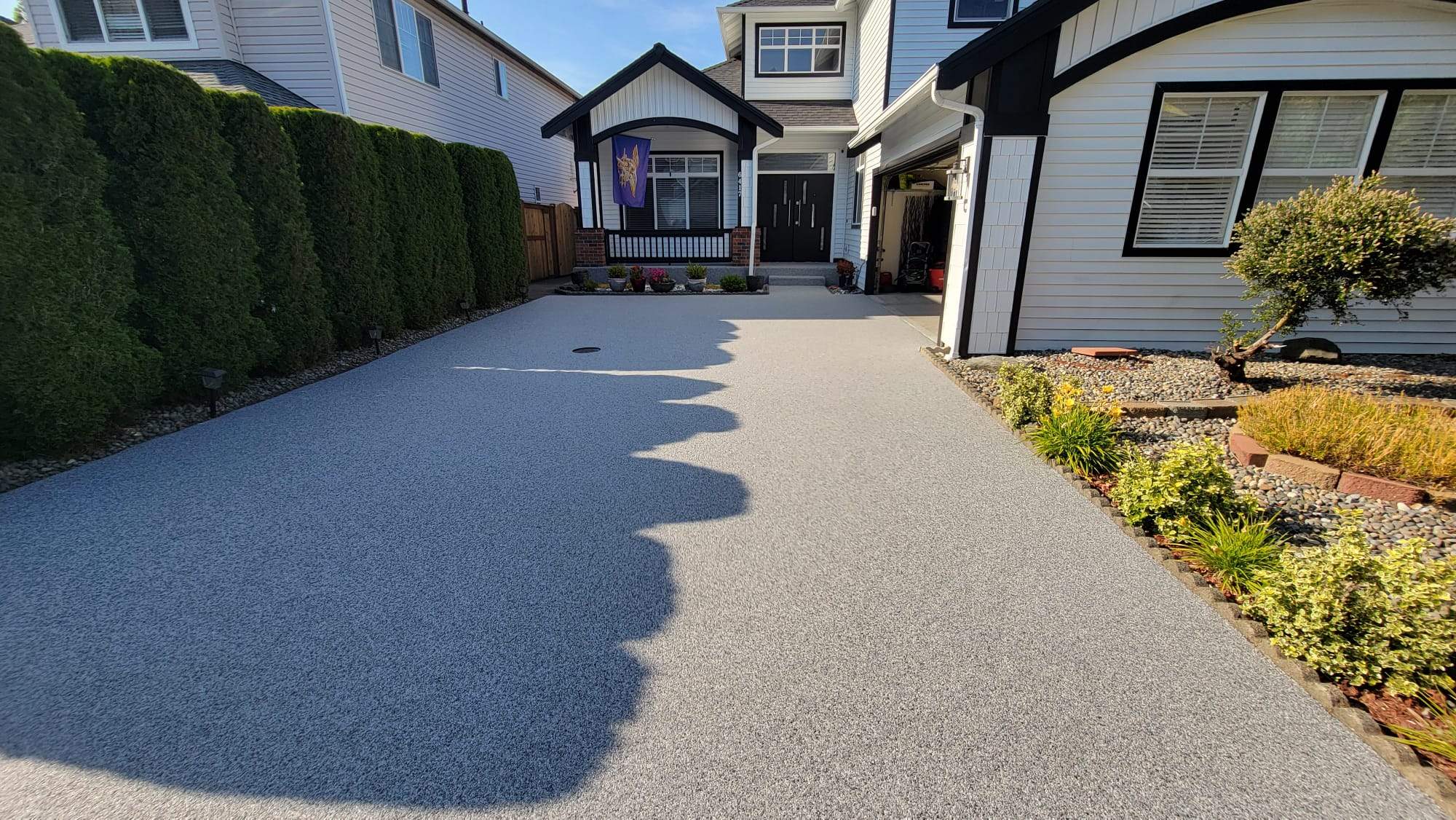 Poseidon Patio and Driveway by Concrete Coating Experts Inc.