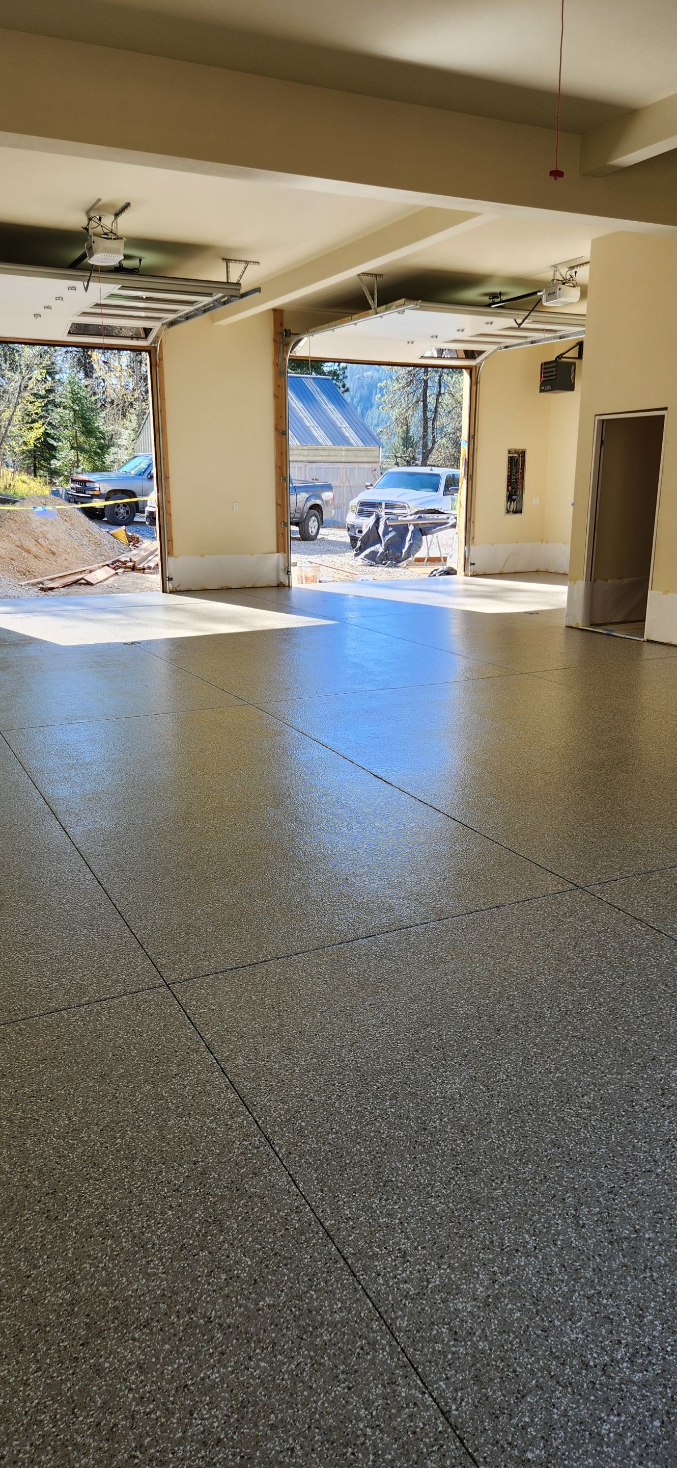 Garage Transformation using Pebble Beach by Croc Coatings, LLC