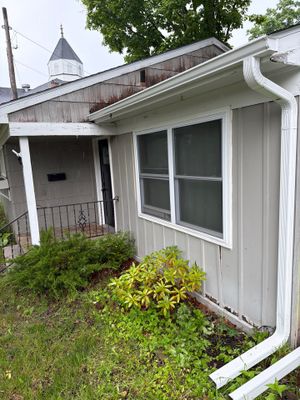 White Gutter and Downspout System Installation in Petoskey