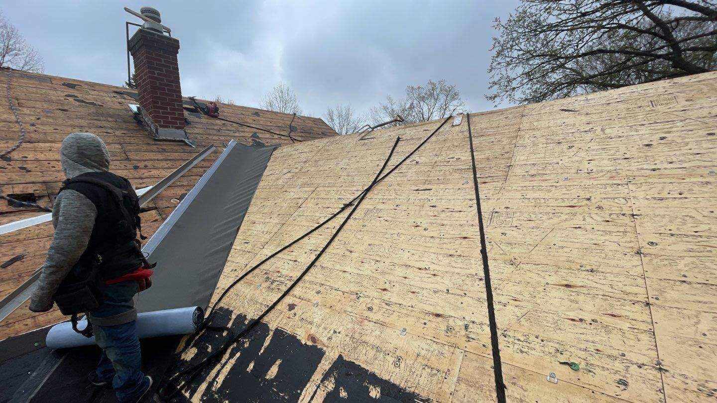 Minneapolis, MN – Roof, Gutter, and Skylight Replacement by First Impressions Exteriors