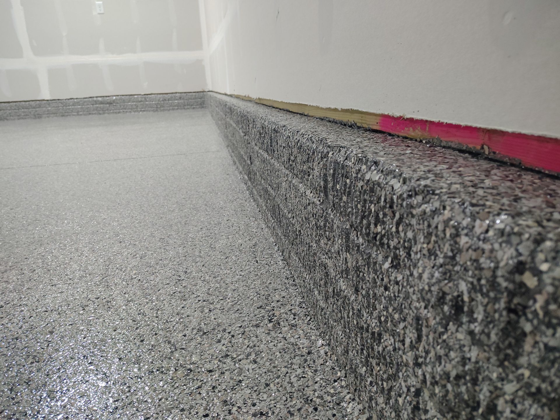 Adel, IA Garage: Complete Keystone Wrap on Floors, Stairs, and Stem Walls by Revival Concrete Coatings