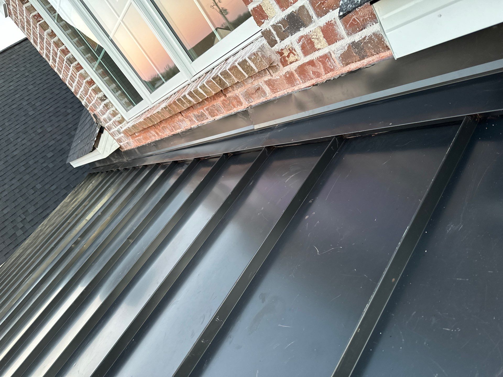Residential Roofing Installation using Tamko Heritage AR with Standing Seam Metal Porch by Undersun Roofing 