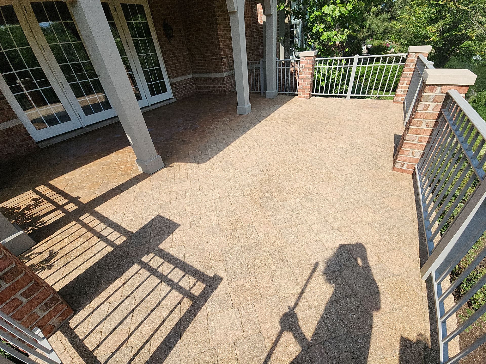 Brick paver cleaning sanding and sealing by Northern Power Washing LLC.