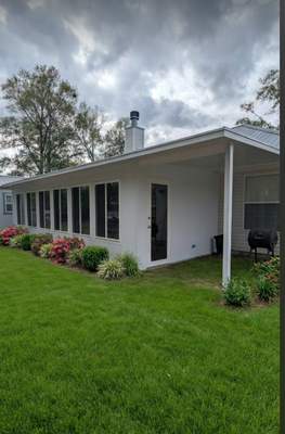 Large Divided Glass Room with Patio cover