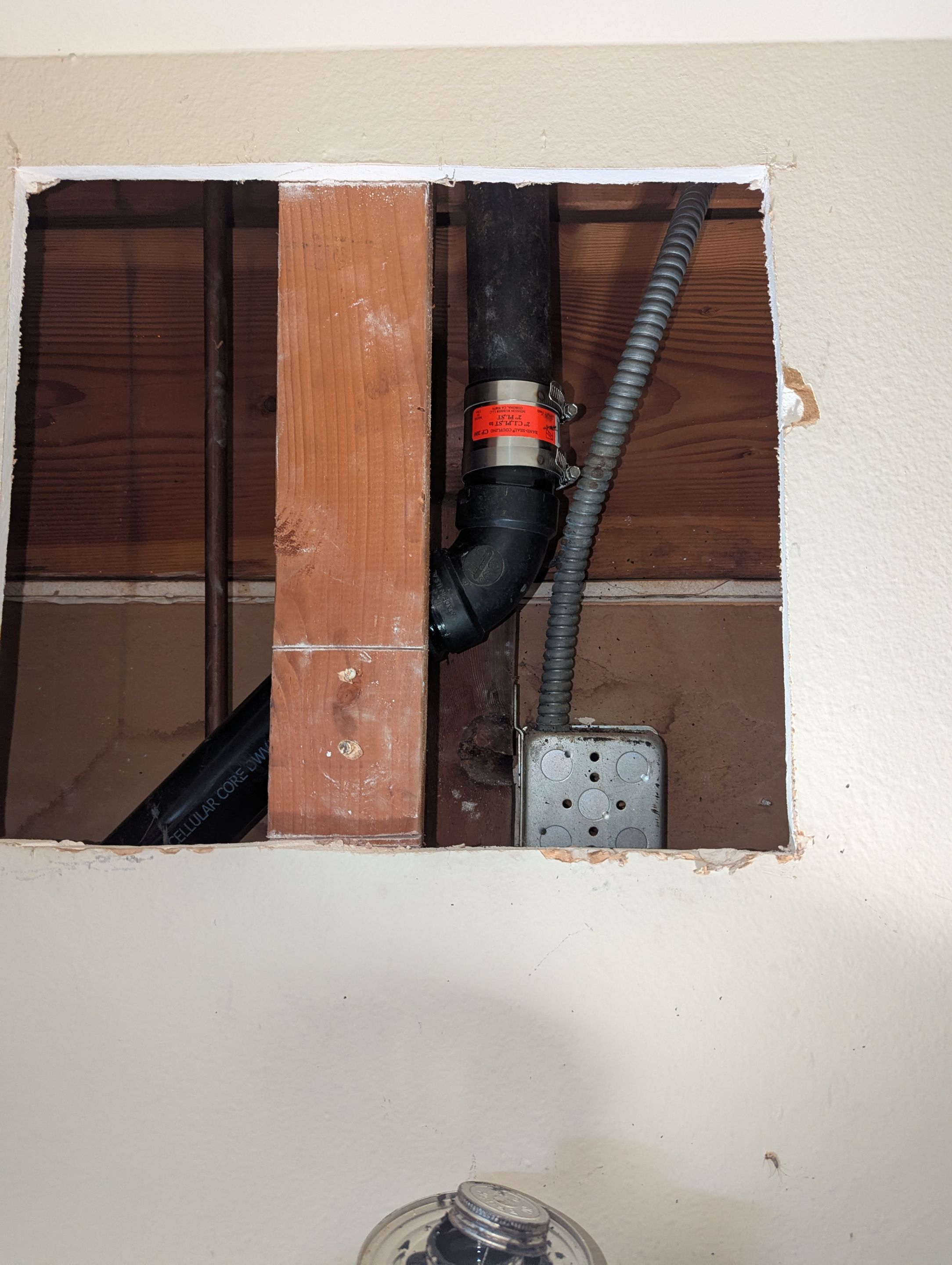 Cracked Cast Iron Line in the wall by Professional Plumbing Inc 