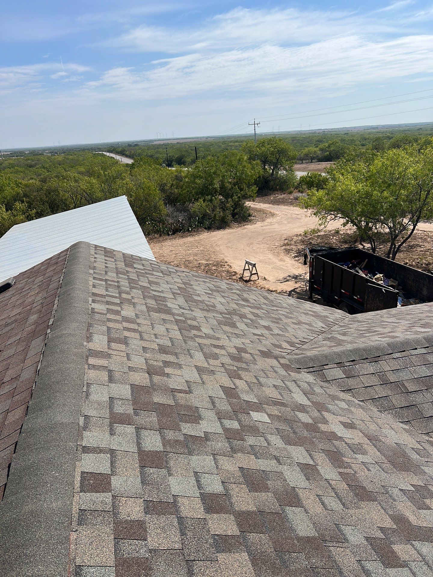 Front Porch Sitt'n by Bayfront Roofing and Construction