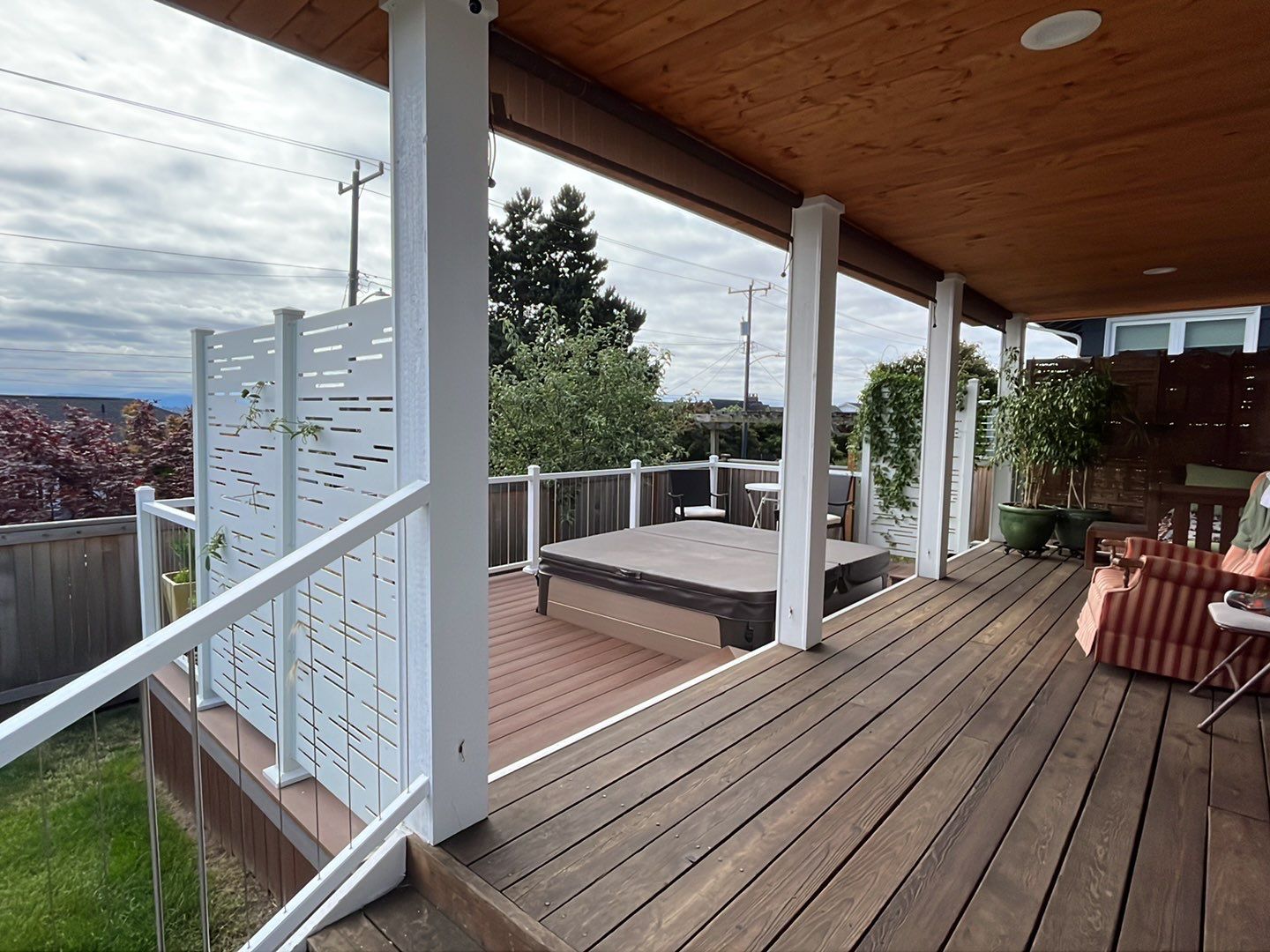Deck Extension with Hideaway Screen by Alki deck builders 